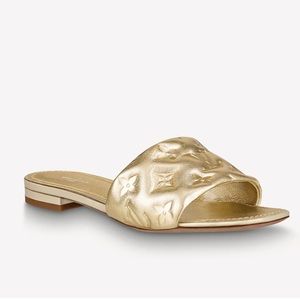 SOLD!! Louis Vuitton gold revival flat mule